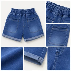 Detalle de shorts de mezclilla para niña con bolsillos grandes, tela denim suave y acabado de calidad