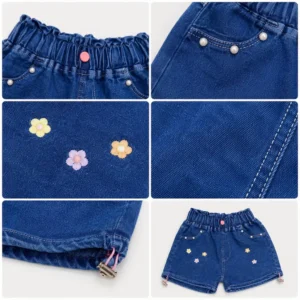 Detalle de tela denim suave de shorts para niña con acabado de alta calidad